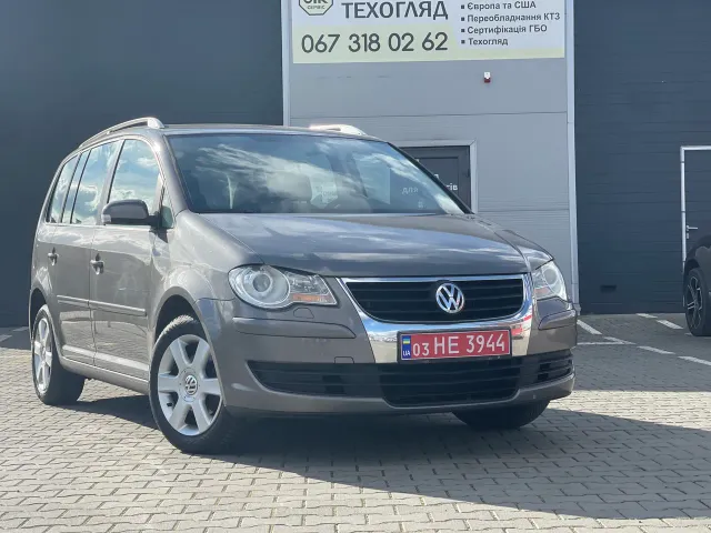 Volkswagen Touran - фото 2