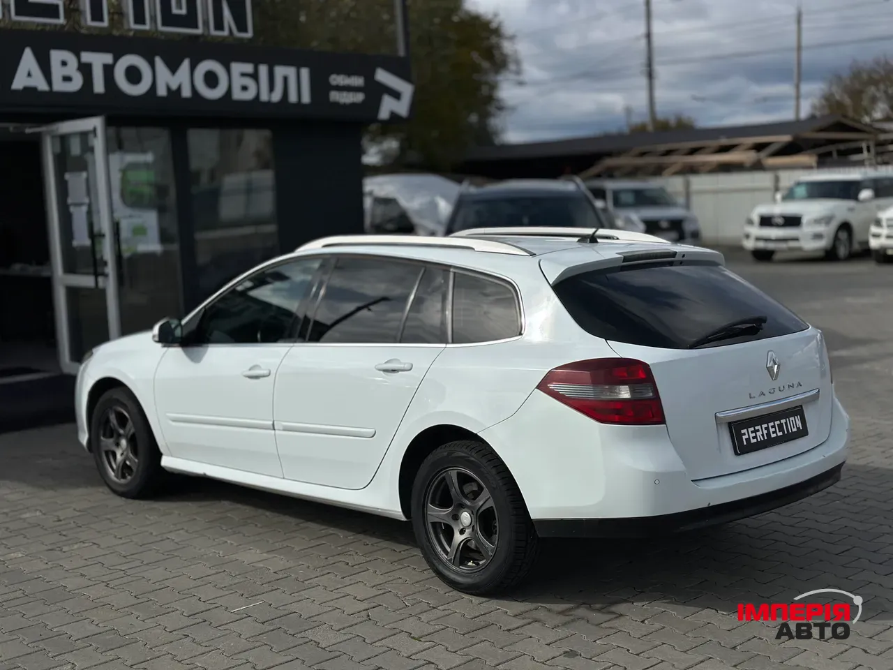 Renault Laguna - фото 11
