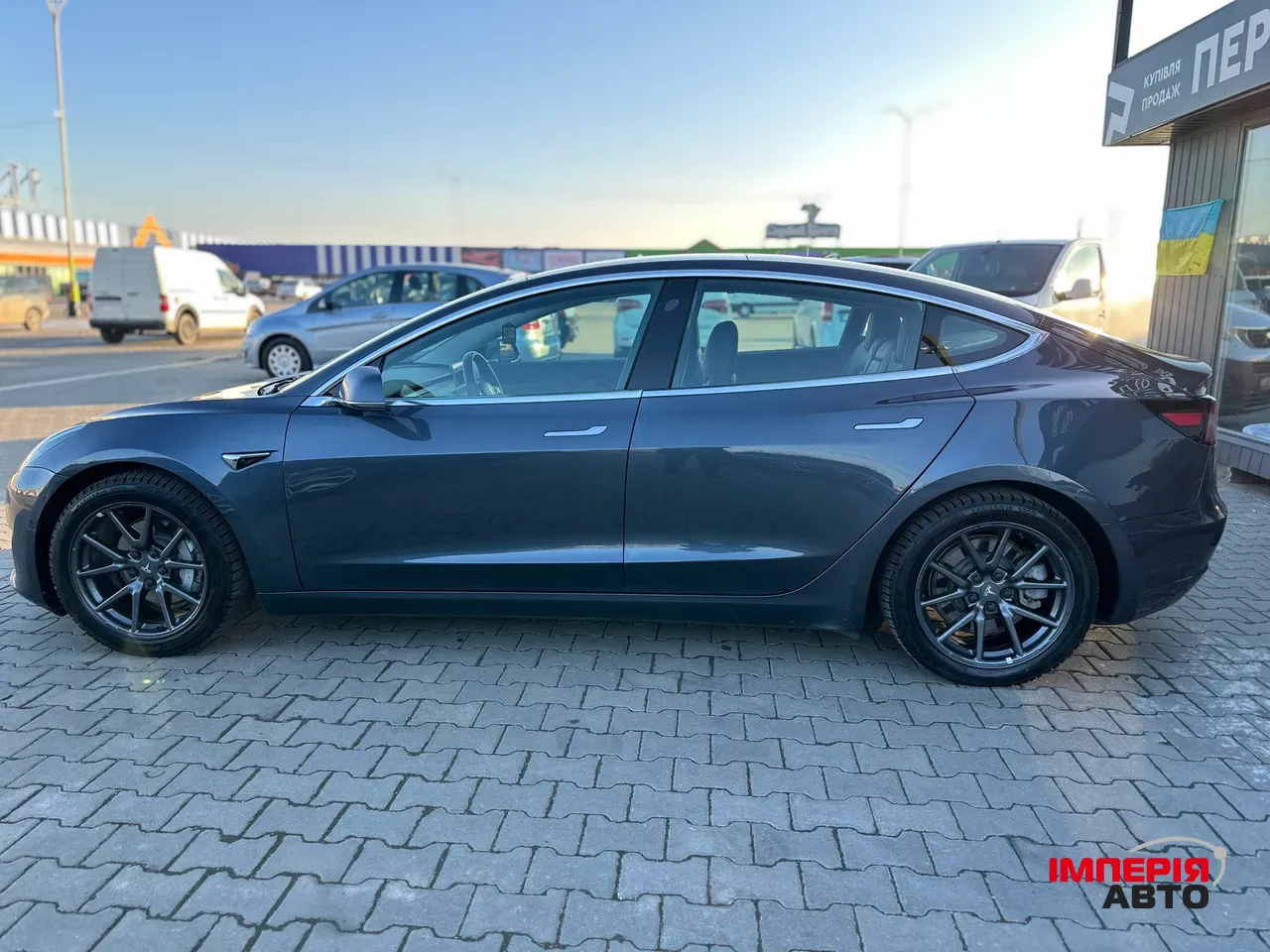 Tesla Model 3 - фото 7