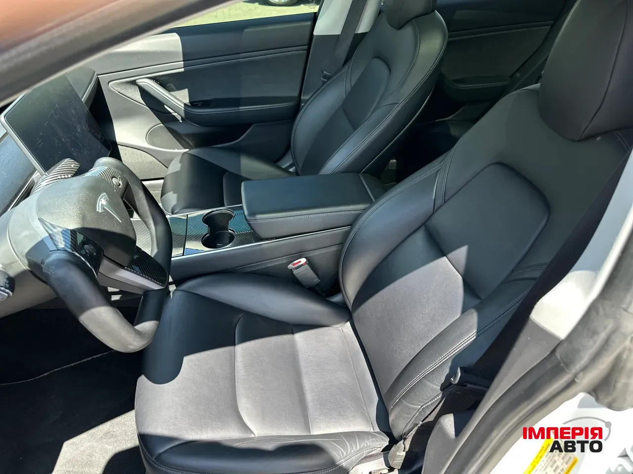 Tesla Model 3 - фото 28