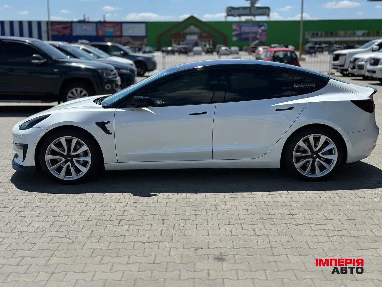 Tesla Model 3 - фото 9