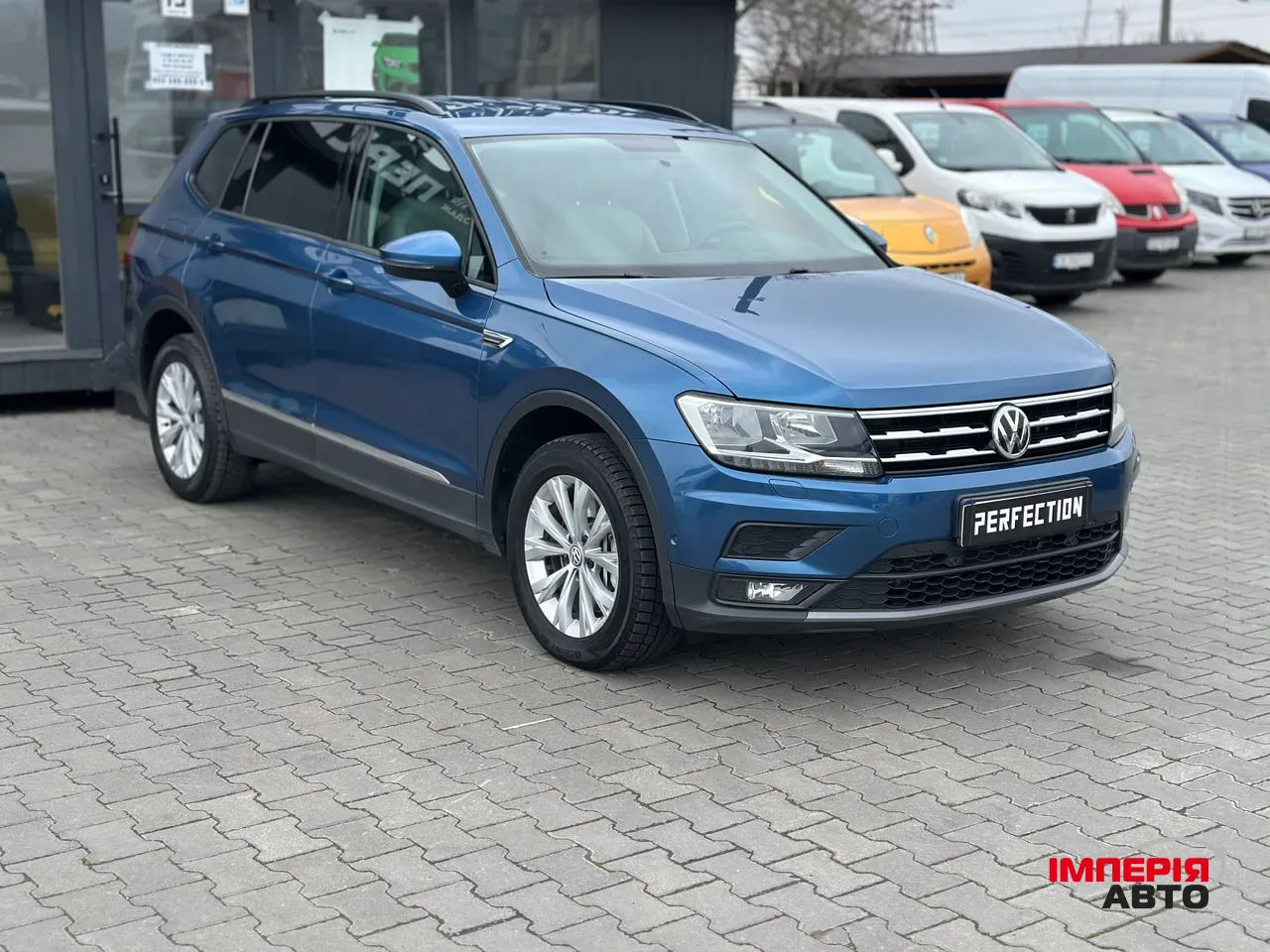 Volkswagen Tiguan - фото 2