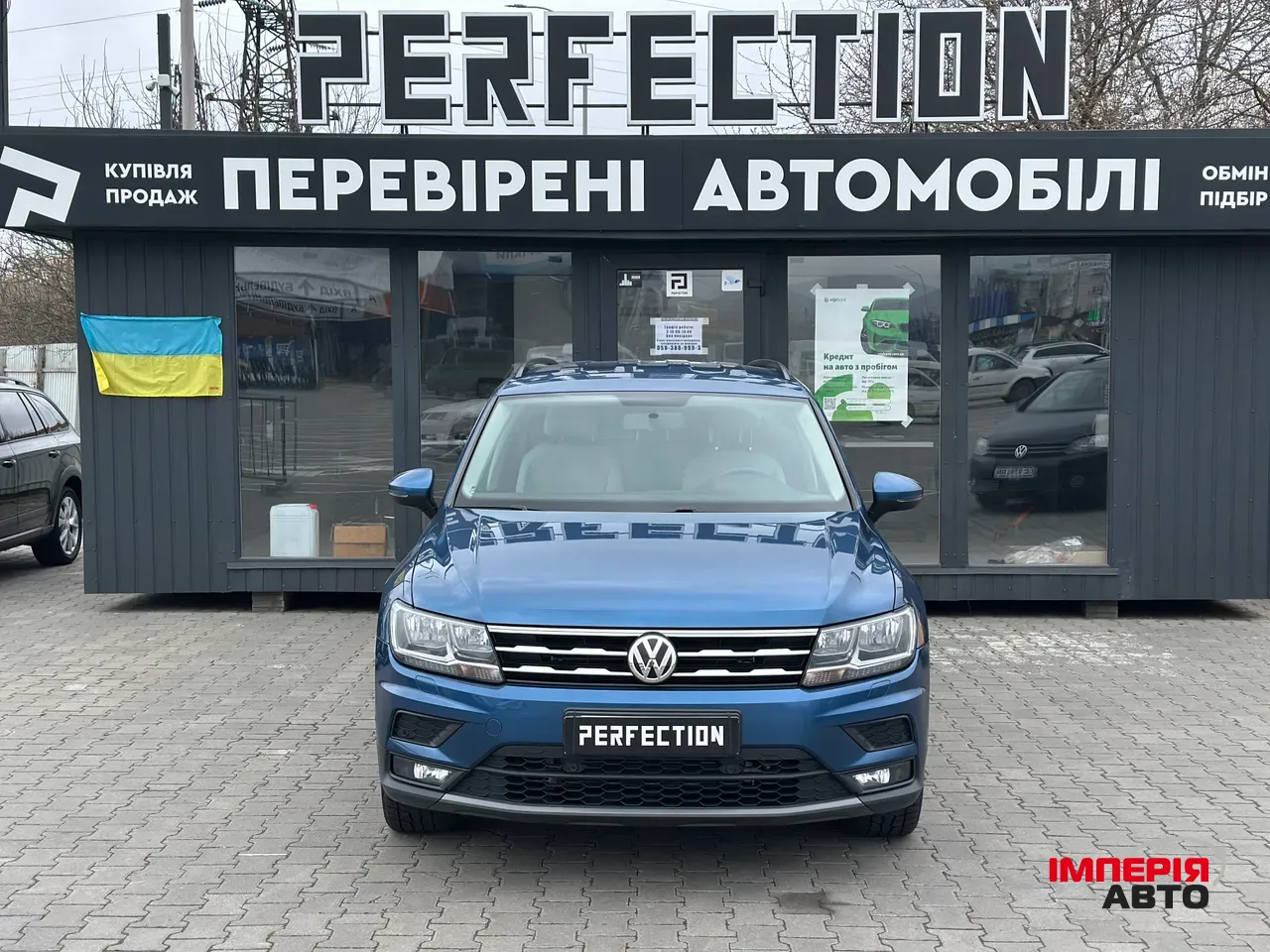 Volkswagen Tiguan - фото 1