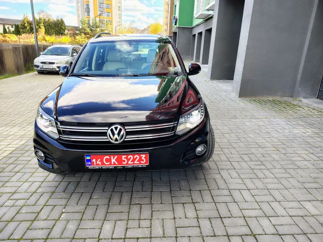 Volkswagen Tiguan - фото 2