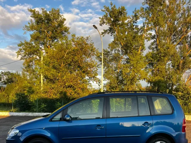 Volkswagen Touran - фото 3