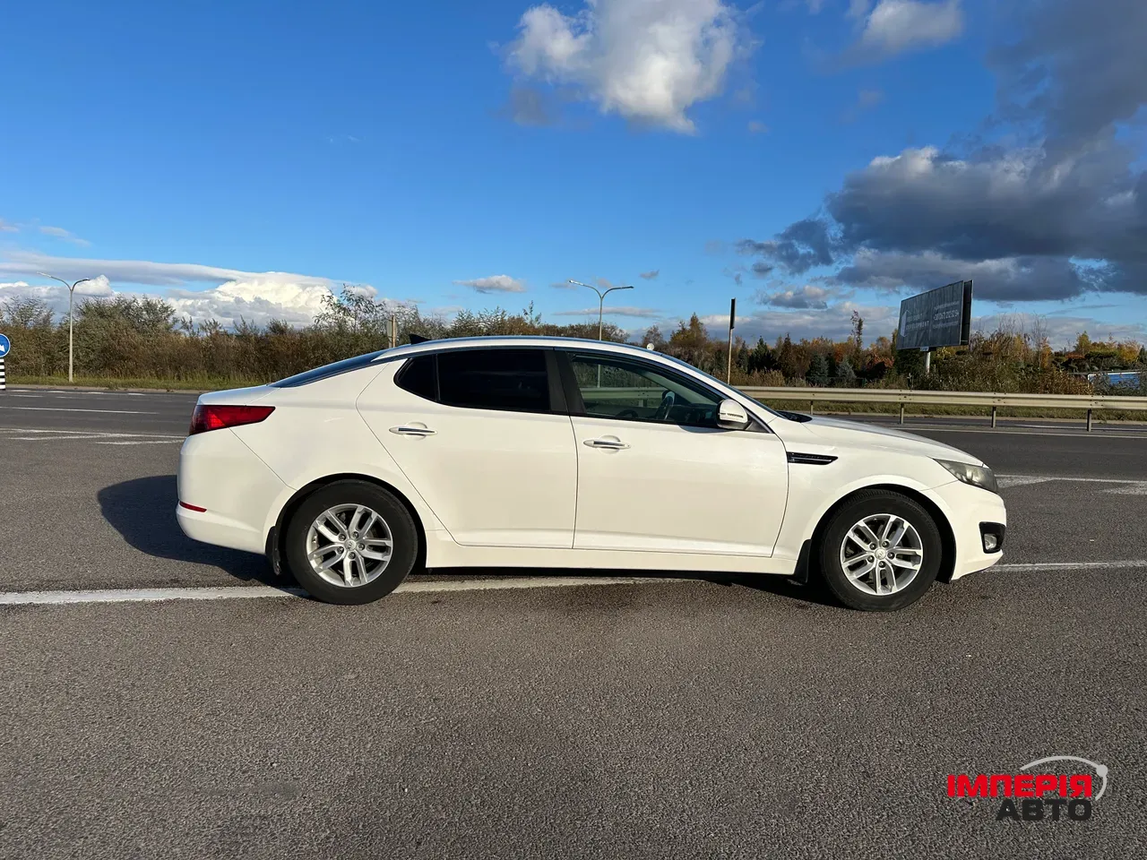 Kia Optima - фото 4
