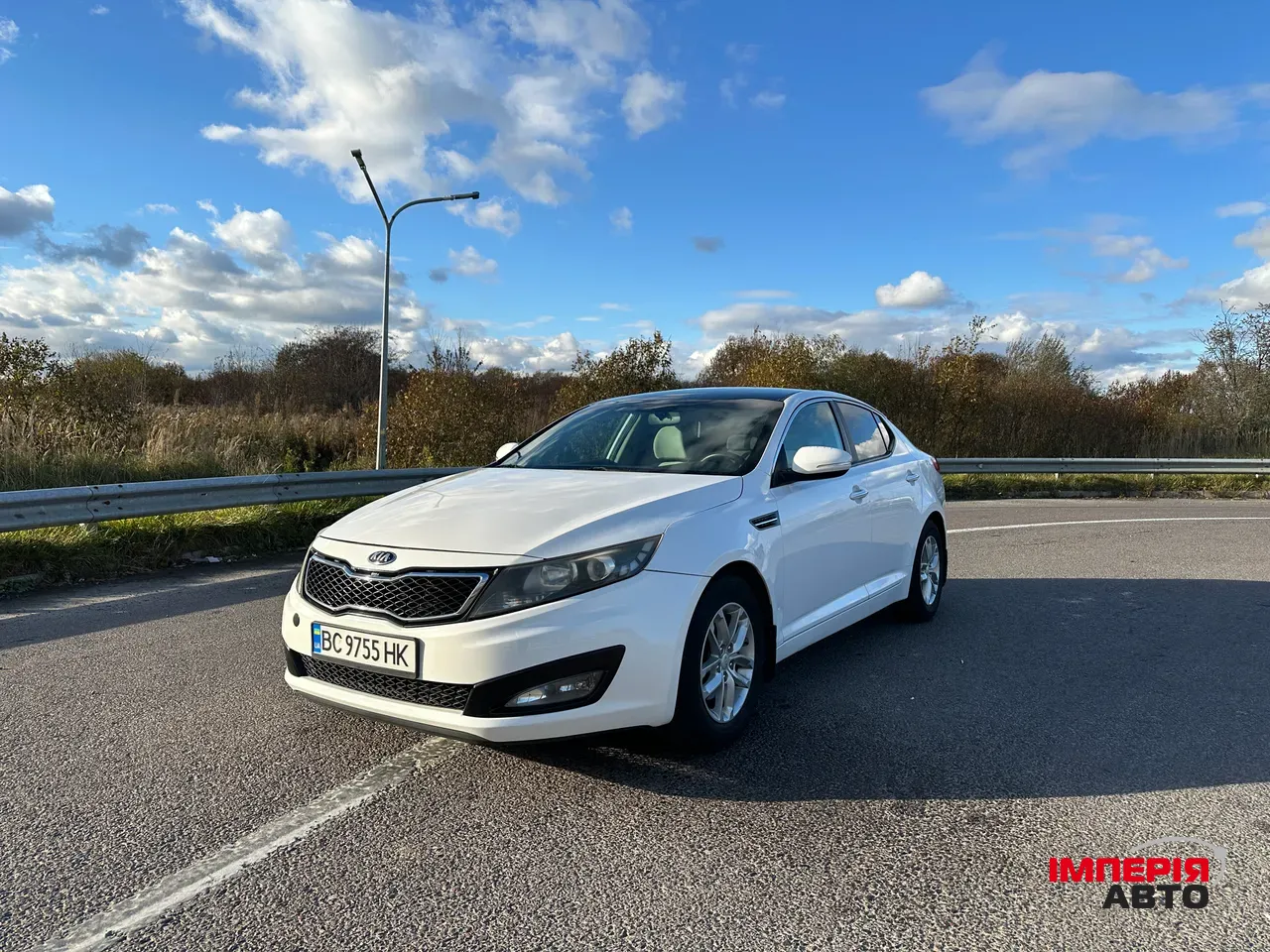 Kia Optima - фото 1