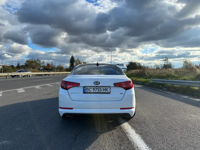 Kia Optima - фото 5