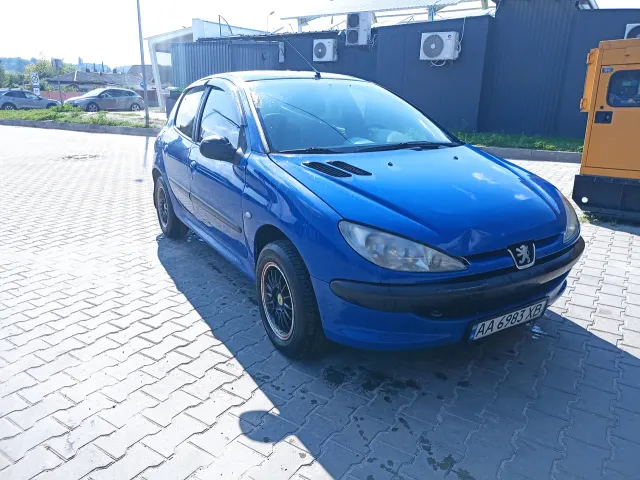 Peugeot 206 - фото 1