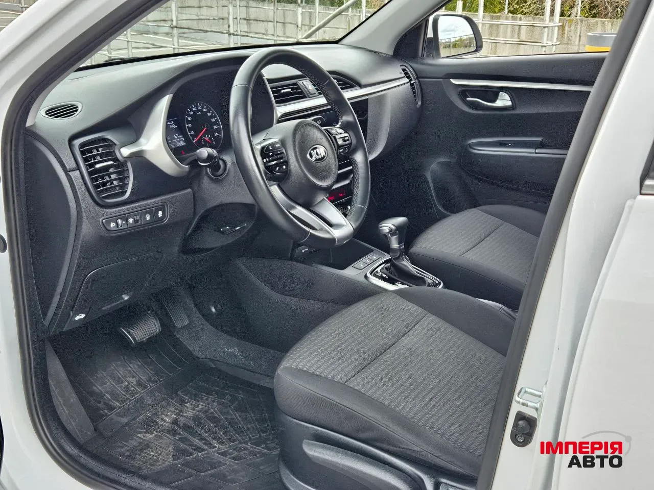 Kia Rio - фото 8