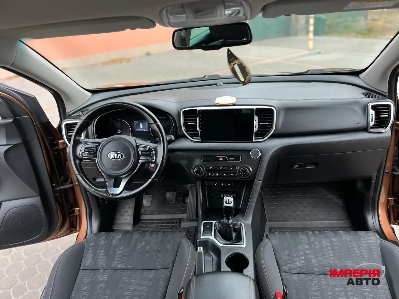 Kia Sportage - фото 7