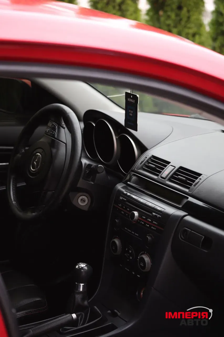 Mazda 3 - фото 10