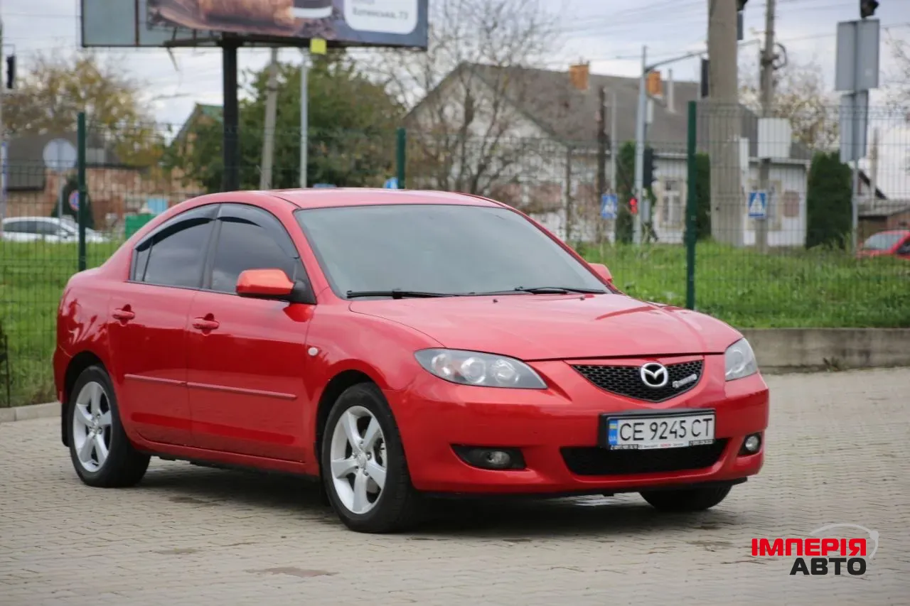 Mazda 3 - фото 5