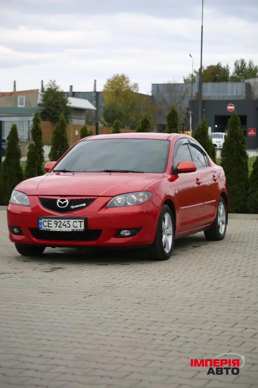 Mazda 3 - фото 4
