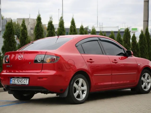 Mazda 3 - фото 2