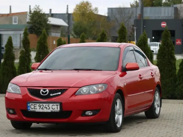 Mazda 3 - фото 4