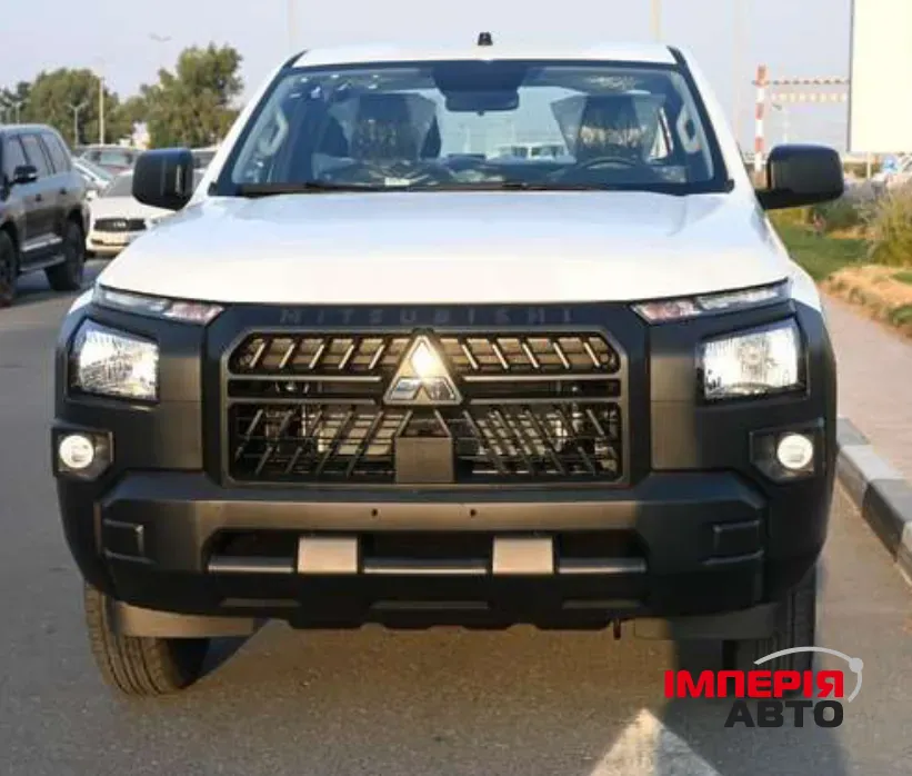 Mitsubishi L200 - фото 1