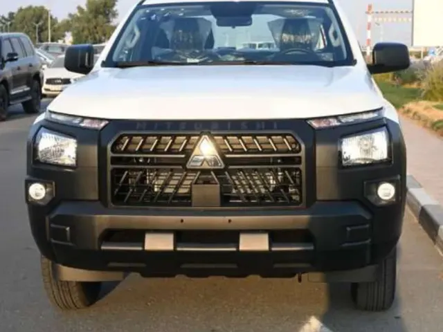 Mitsubishi L200 - фото 1