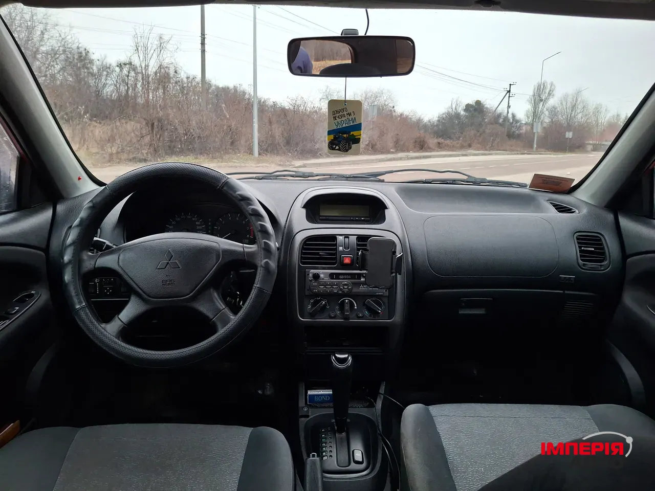 Mitsubishi Carisma - фото 6