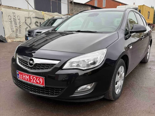 Opel Astra - фото 1