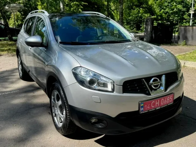 Nissan Qashqai+2 - фото 1