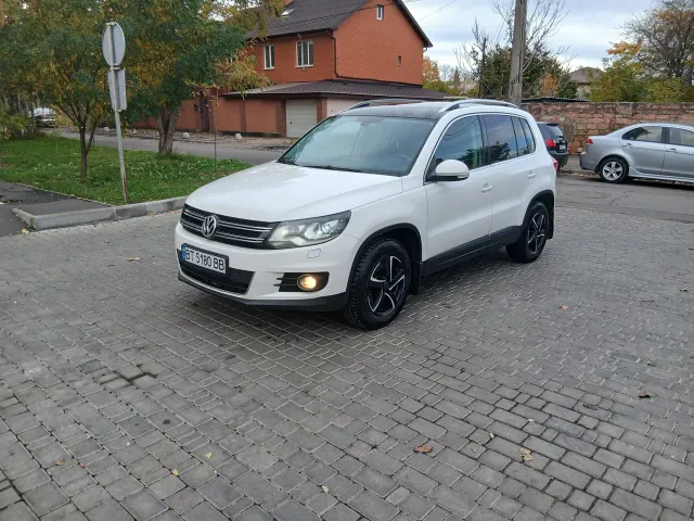 Volkswagen Tiguan - фото 1
