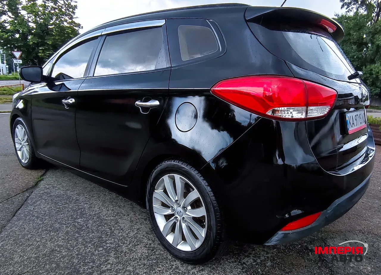 Kia Carens - фото 3