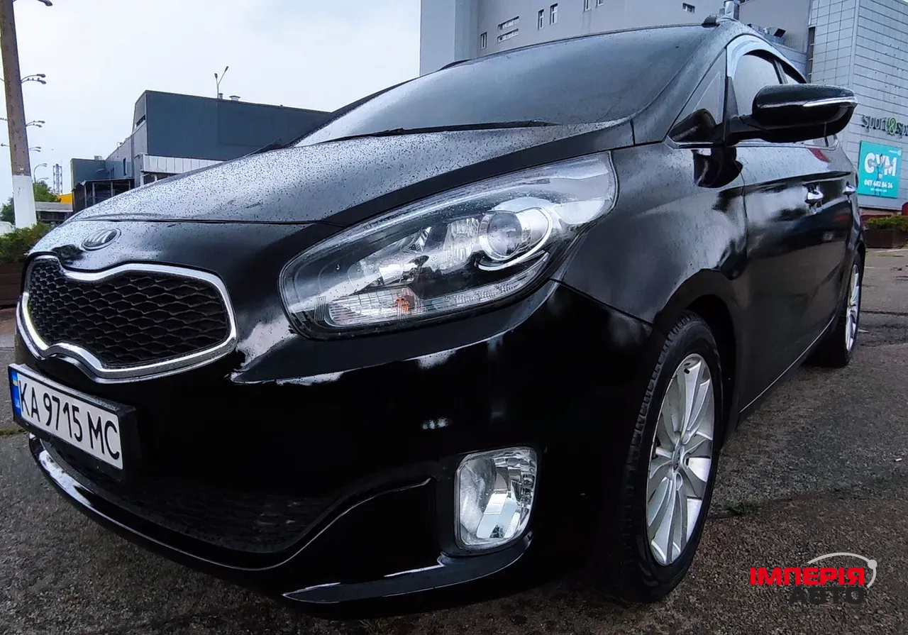 Kia Carens - фото 4