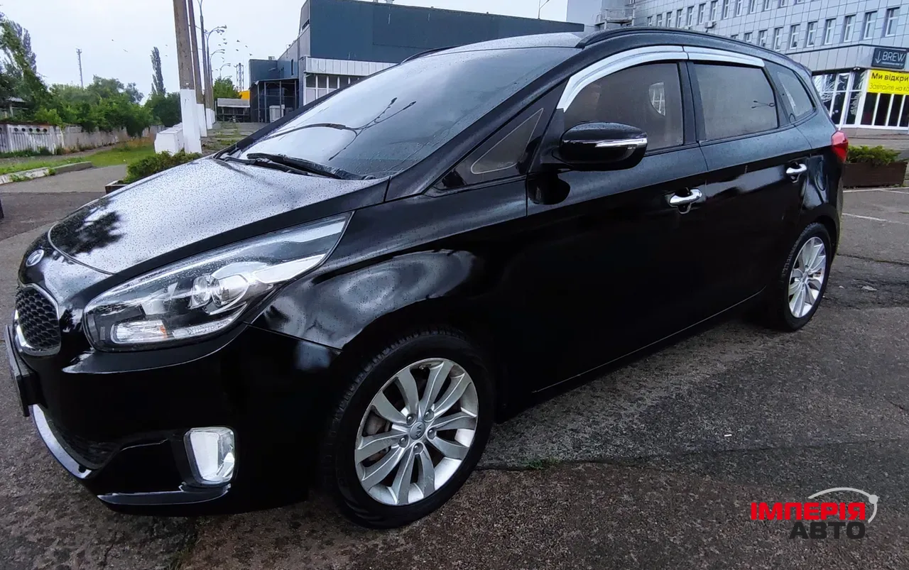 Kia Carens - фото 5