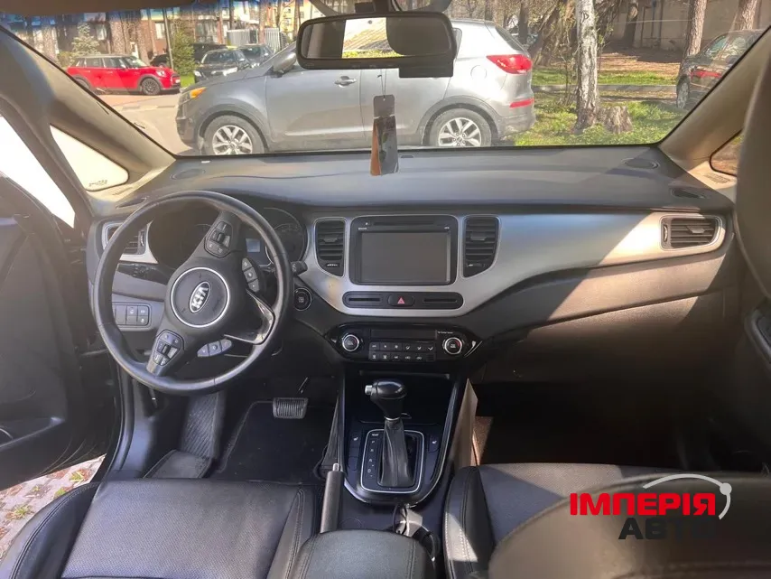 Kia Carens - фото 6