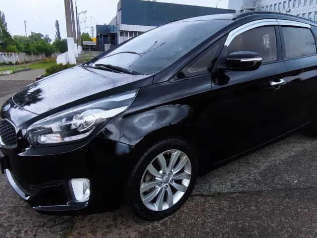 Kia Carens - фото 5