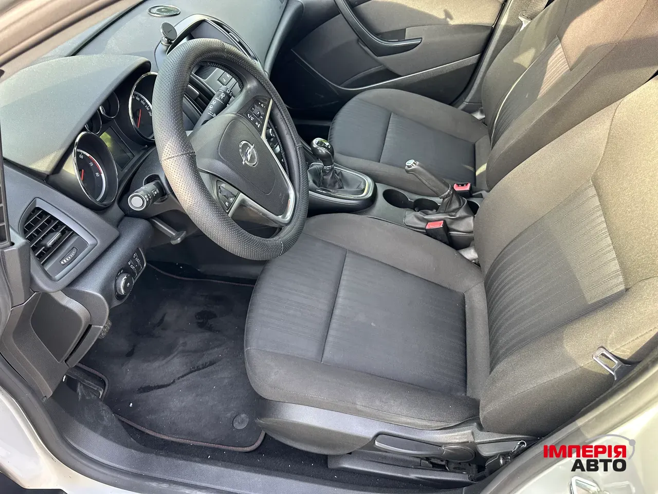 Opel Astra - фото 12