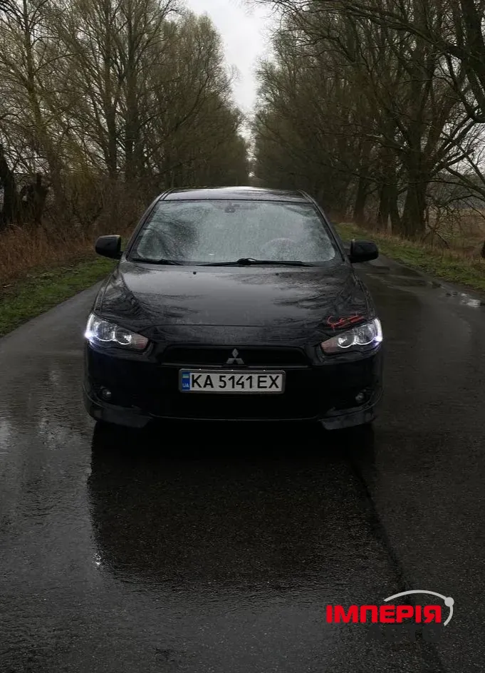Mitsubishi Lancer - фото 3