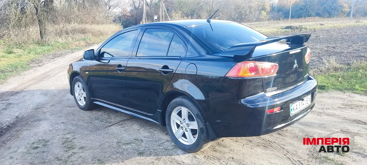 Mitsubishi Lancer - фото 32