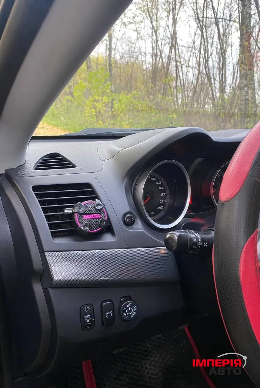 Mitsubishi Lancer - фото 6