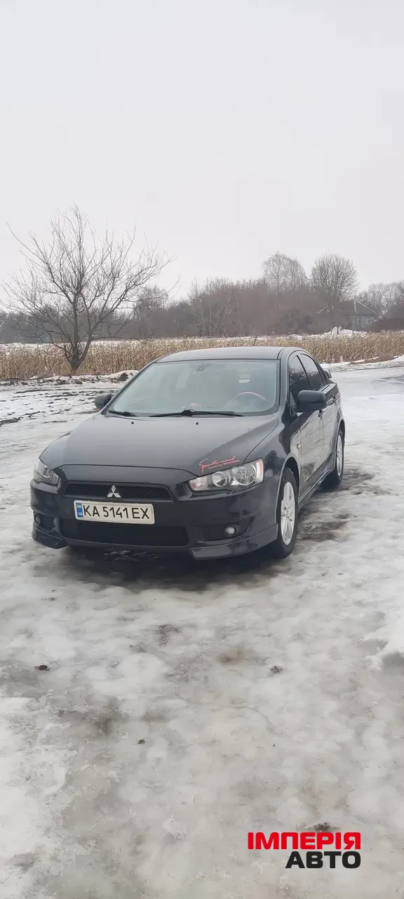 Mitsubishi Lancer - фото 1