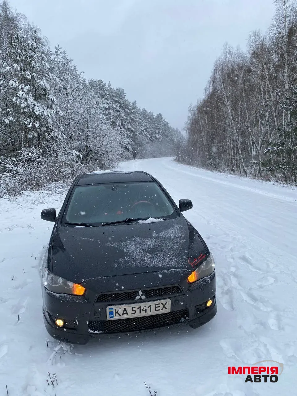 Mitsubishi Lancer - фото 4