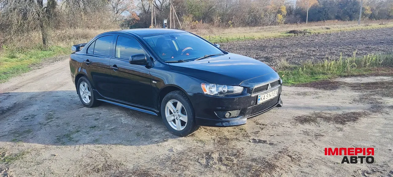 Mitsubishi Lancer - фото 34