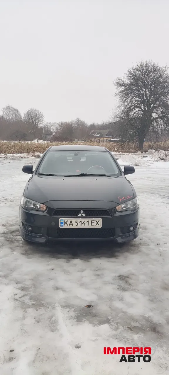 Mitsubishi Lancer - фото 2