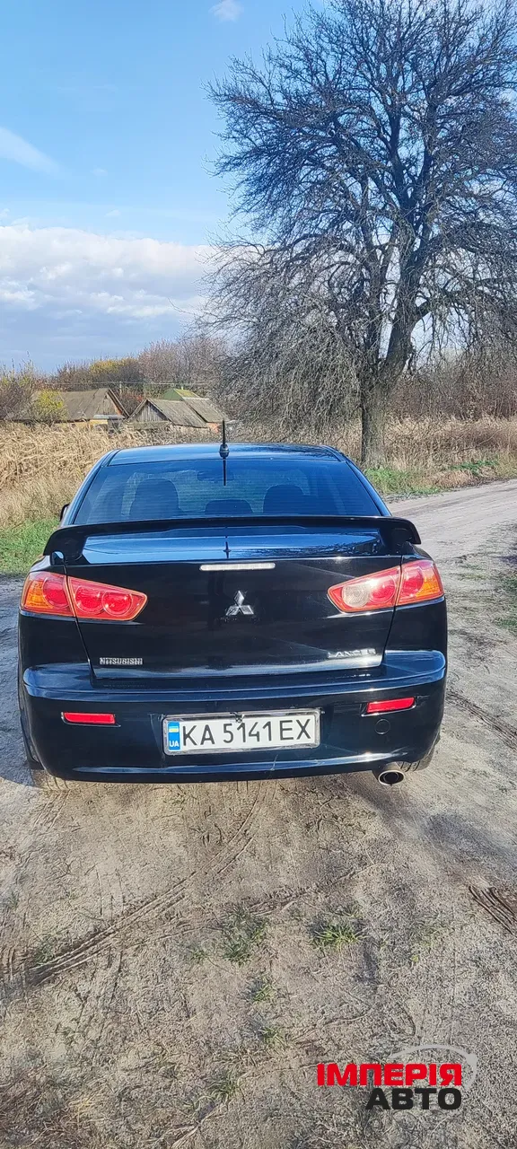 Mitsubishi Lancer - фото 31