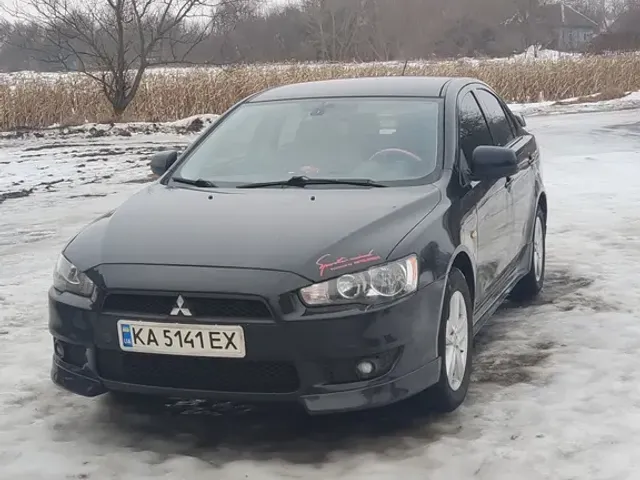 Mitsubishi Lancer - фото 1