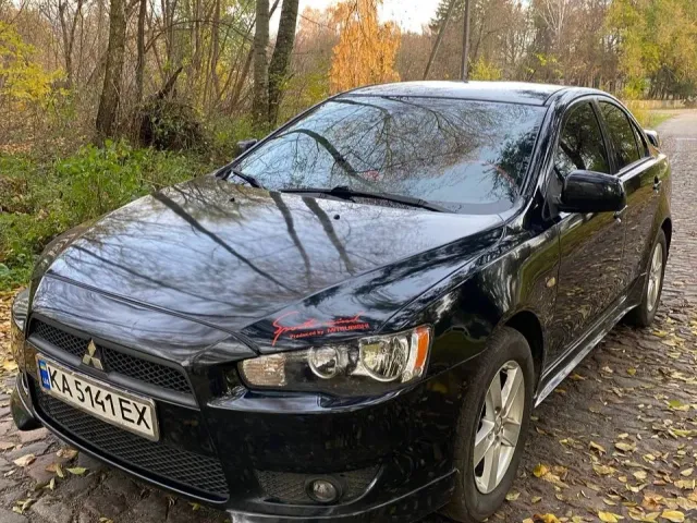 Mitsubishi Lancer - фото 1
