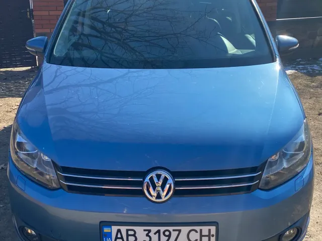 Volkswagen Touran - фото 1