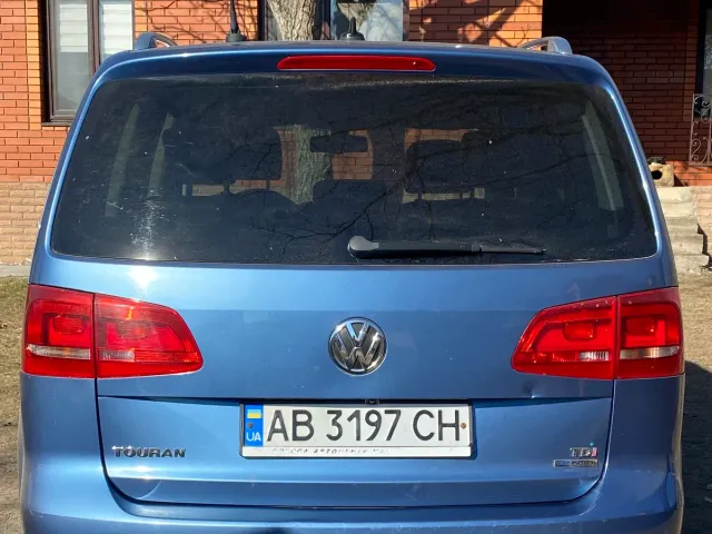 Volkswagen Touran - фото 3