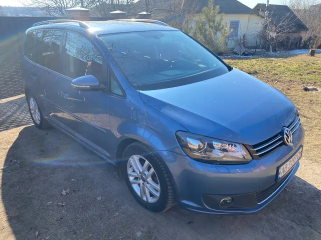 Volkswagen Touran - фото 2