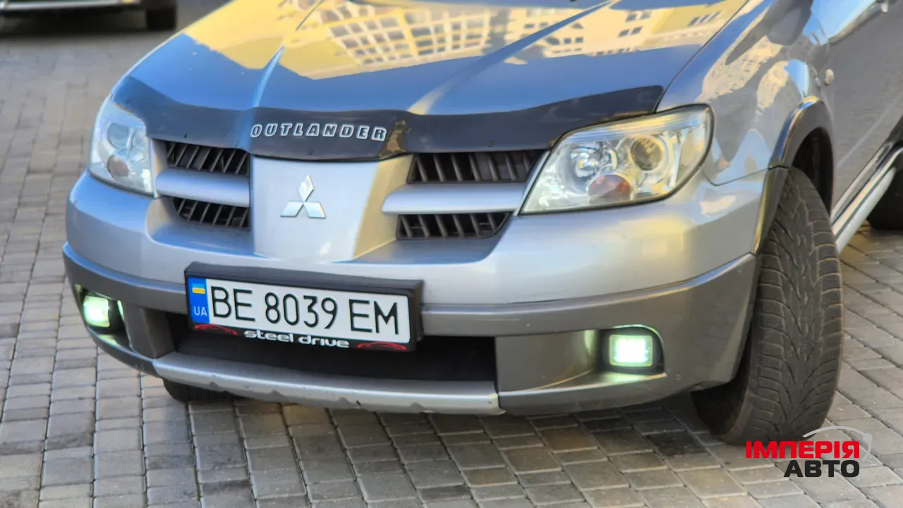 Mitsubishi Outlander - фото 13