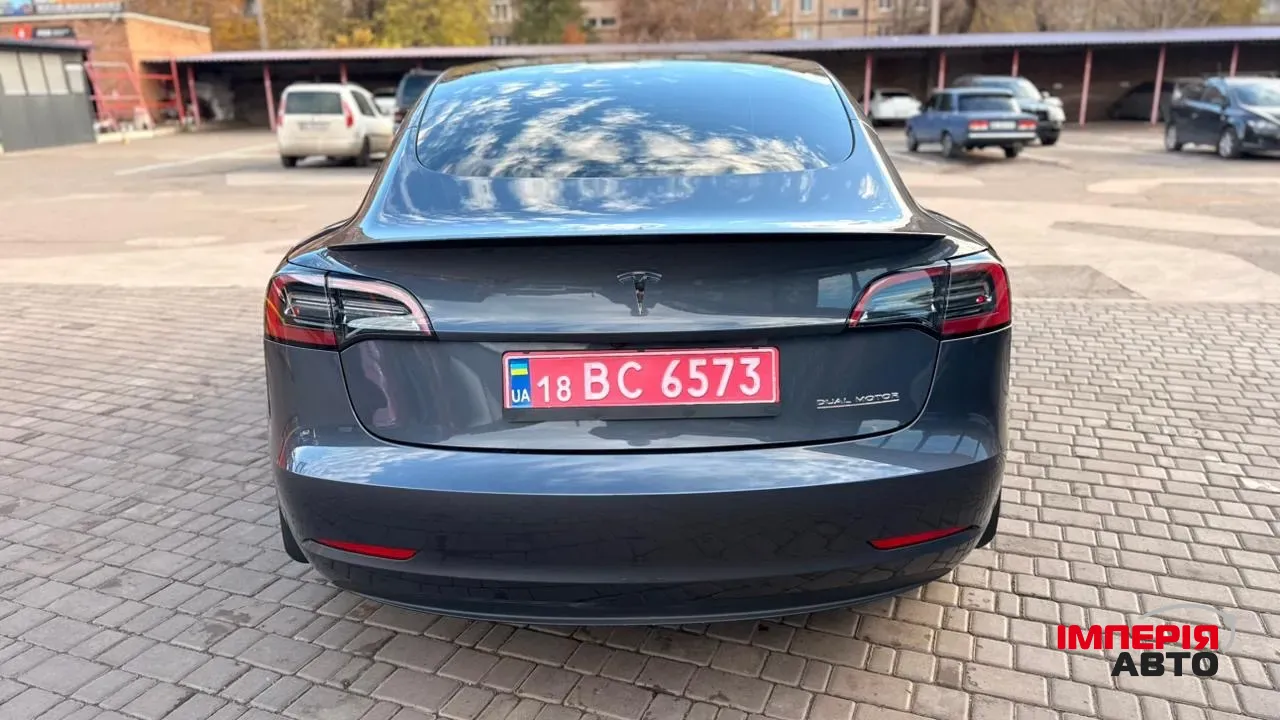Tesla Model 3 - фото 10