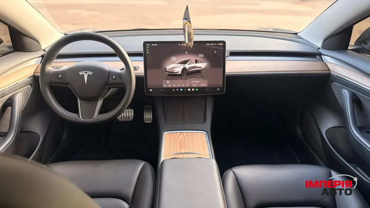 Tesla Model 3 - фото 13