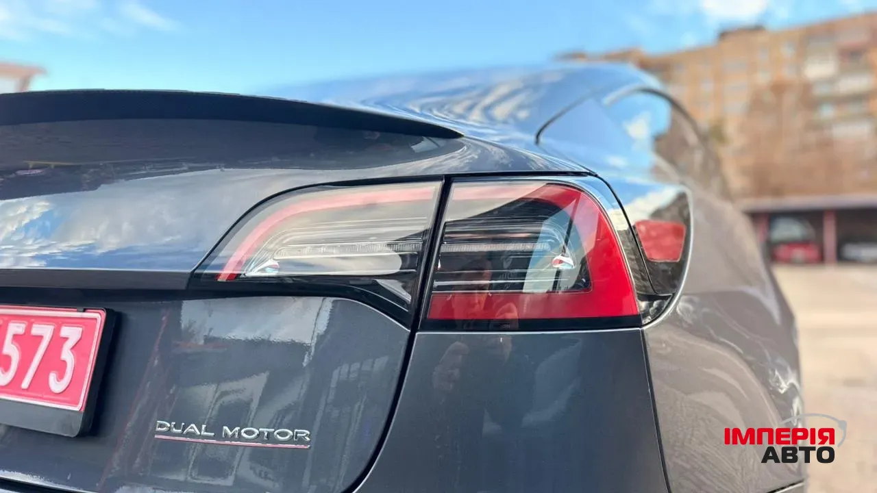 Tesla Model 3 - фото 11