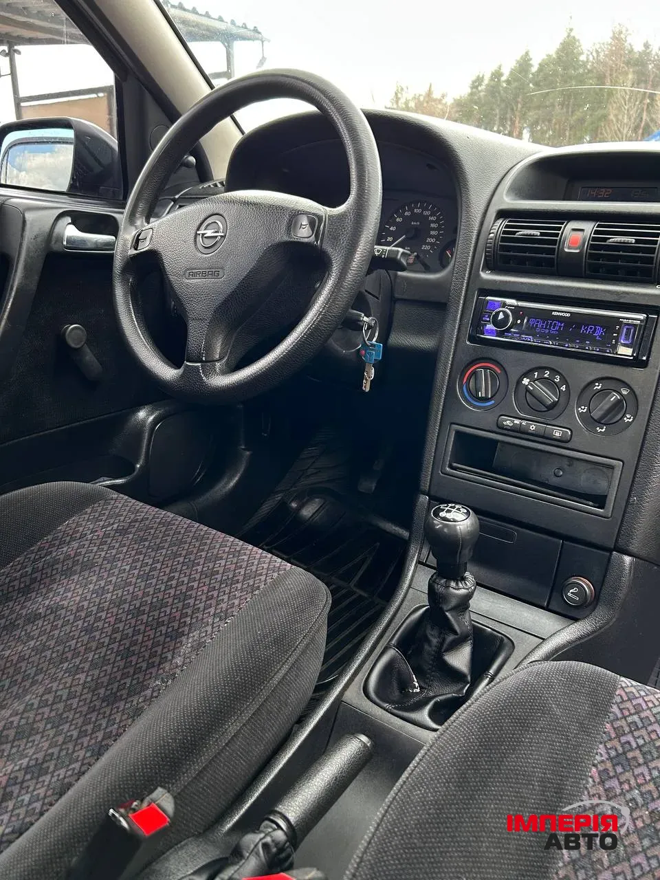 Opel Astra - фото 7